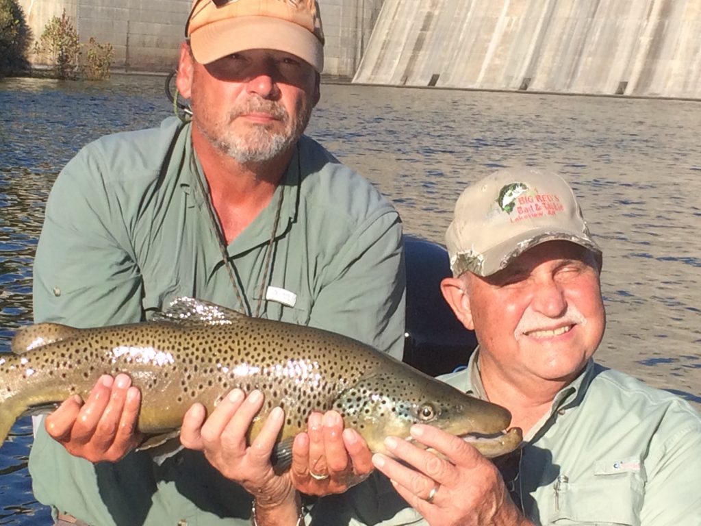 Ron catches a big brown trout fishing with Duane Bell, White River Troutfitters in Bull Shoals, Arkansas